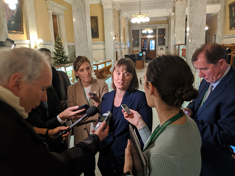 Dana Fisher speaks to media on December 9, 2019